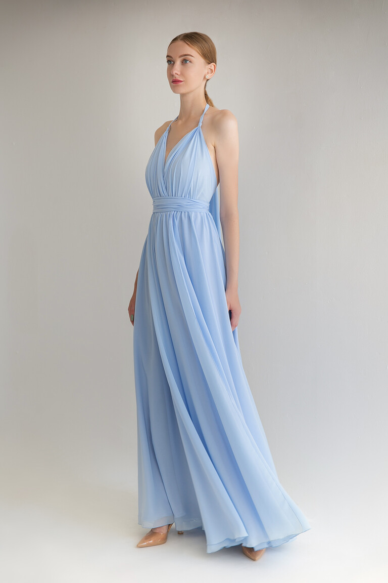 Three-quarter view of the Unona Calypso blue floor-length gown showcasing its flowing A-line chiffon skirt.