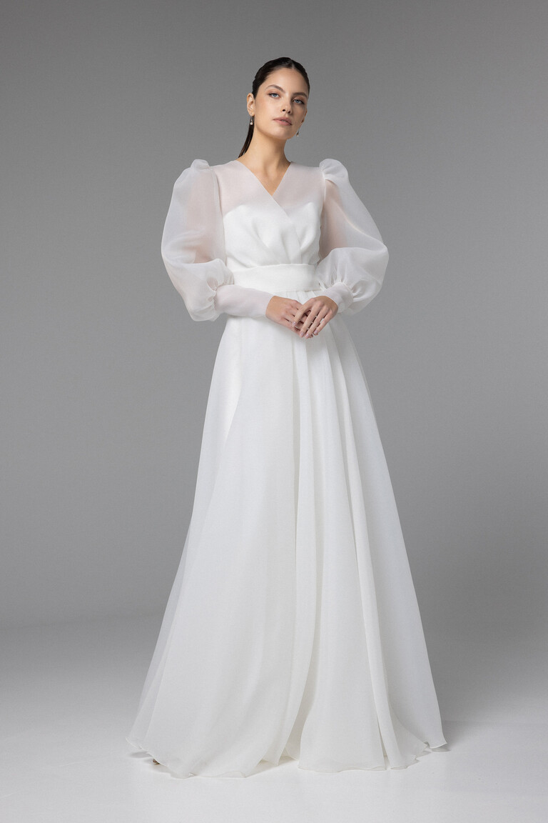 Elegant Floor Length Sheer Organza Bridal Cape by Unona Full length front view of Cape Sonia ivory sheer organza cape featuring voluminous balloon sleeves and A-line silhouette.