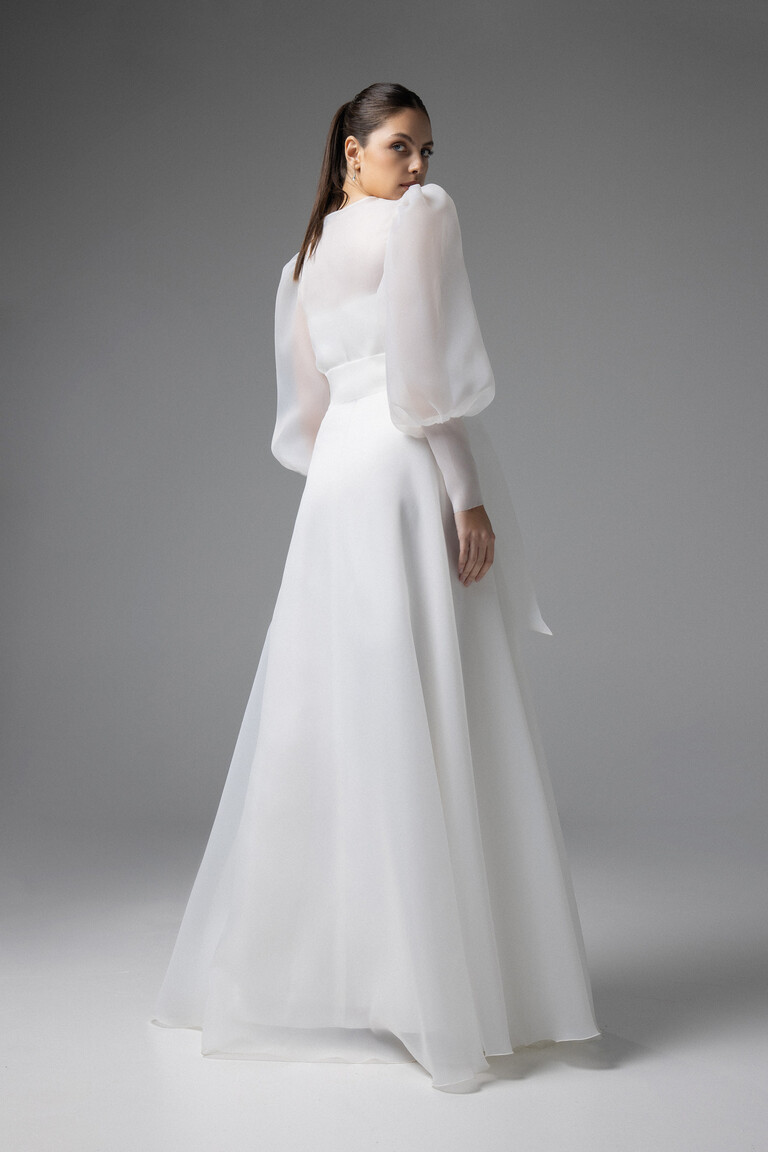 Stunning A-Line Silhouette of Cape Sonia Sheer Organza Overlay Back side angle of Cape Sonia ivory organza bridal wrap displaying the A-line sheer overlay silhouette and long sleeves.