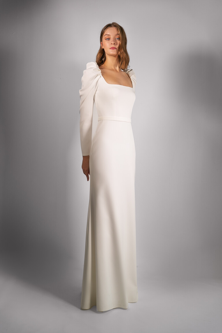 Classic Bianca Long Sleeve Bridal Gown Full length front view of Bianca classic ivory crepe wedding dress with long sleeves by Unona.