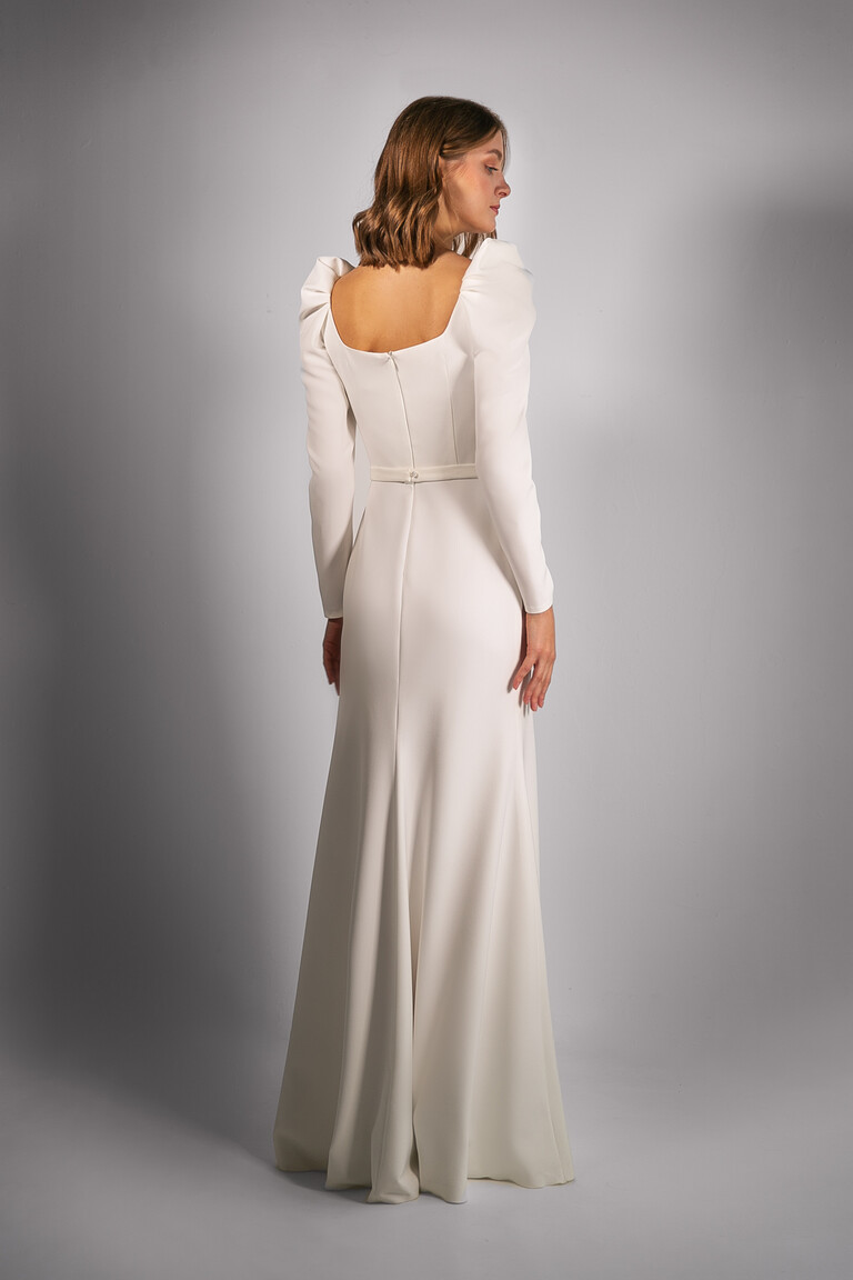 Bianca Floor Length Gown Back View Full back view of Unona Bianca ivory floor length wedding dress showing square open back and zipper closure.