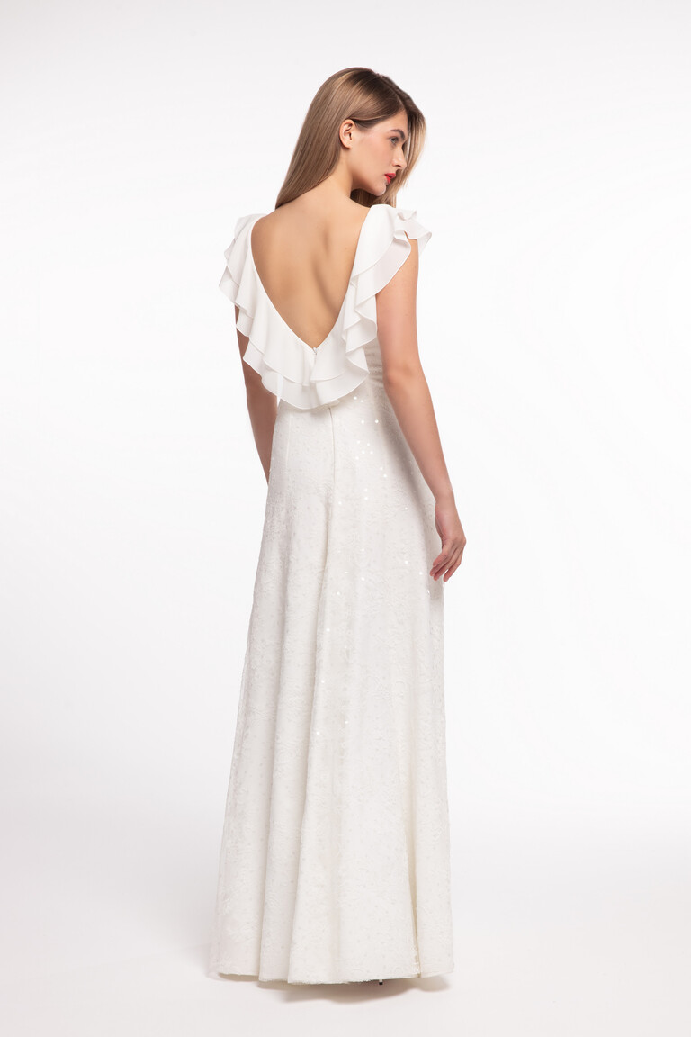 Elegant back view of the Alison romantic wedding dress highlighting the deep V-back, chiffon flounces, and sequined skirt.