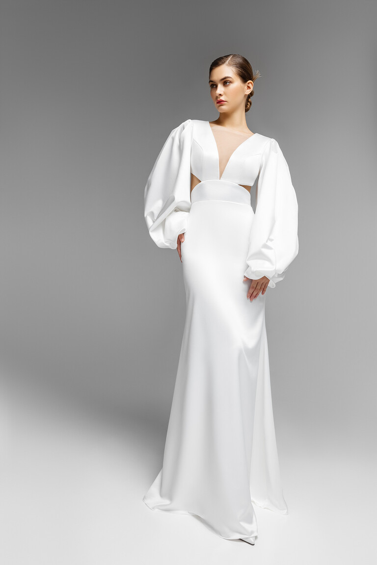 Modern Hannah Ivory Satin Wedding Dress Front View Full-length front view of Hannah ivory satin mermaid wedding dress with plunging V-neck and voluminous long sleeves.