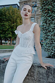 Off-White Lace Bridal Corset with Peplum Waist preview photo # 5