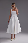 Vlada Midi Square Neck Wedding Dress Front View Vlada midi off-white satin wedding dress front view with square neckline and A-line skirt by Unona