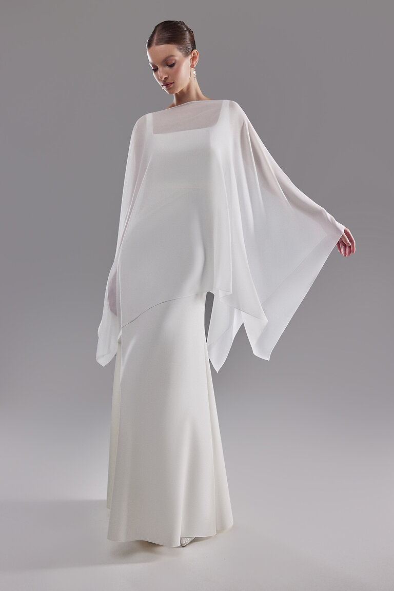 Iman Sheer Chiffon Bridal Cape Full Length Full-length front view of Unona Iman white sheer chiffon bridal cape over a minimalist wedding gown.