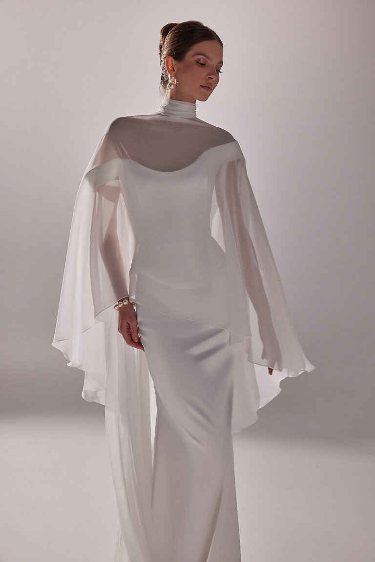 Modern Minimalist Naila Wedding Cape Front view of Unona Naila sheer chiffon cape with a high neck draping beautifully over shoulders for a modern bridal look.