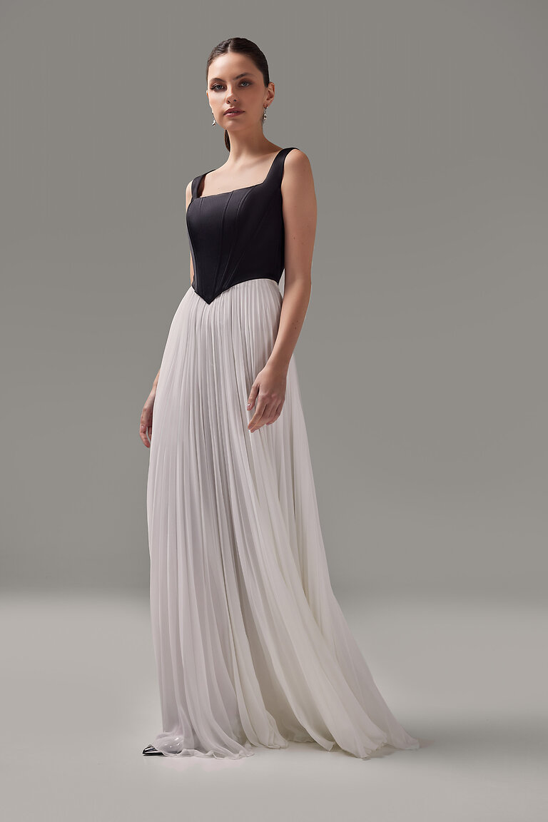 Elegant Black Evening Corset Styled with Skirt Full body view of the Casia black evening corset by Unona featuring a modern square neck