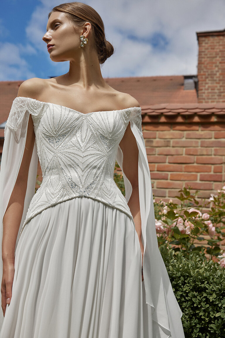 Intricate Beaded Basque Waist Corset Leona Bodice detail of Leona ivory bridal set with intricate beadwork sweetheart neckline and basque waist by Unona
