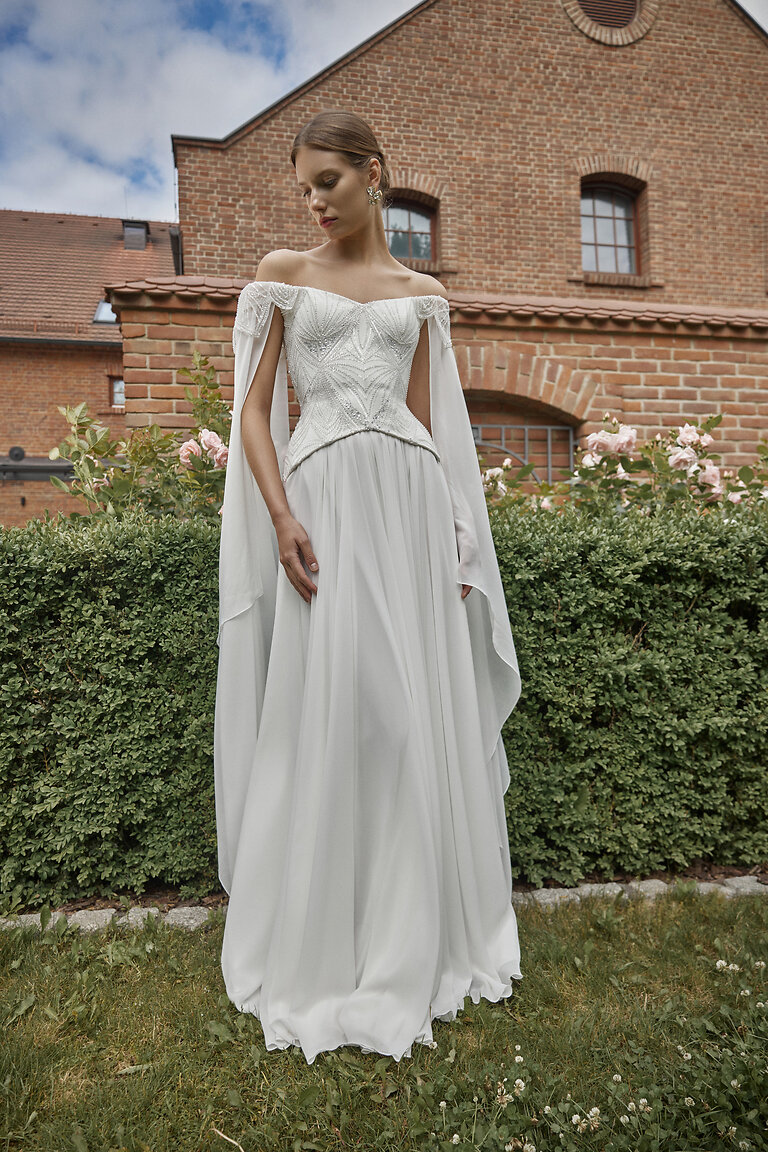 Boho A-Line Wedding Dress Leona Full Length Full length view of Leona ivory boho wedding dress with drop waist corset and flowing chiffon skirt by Unona