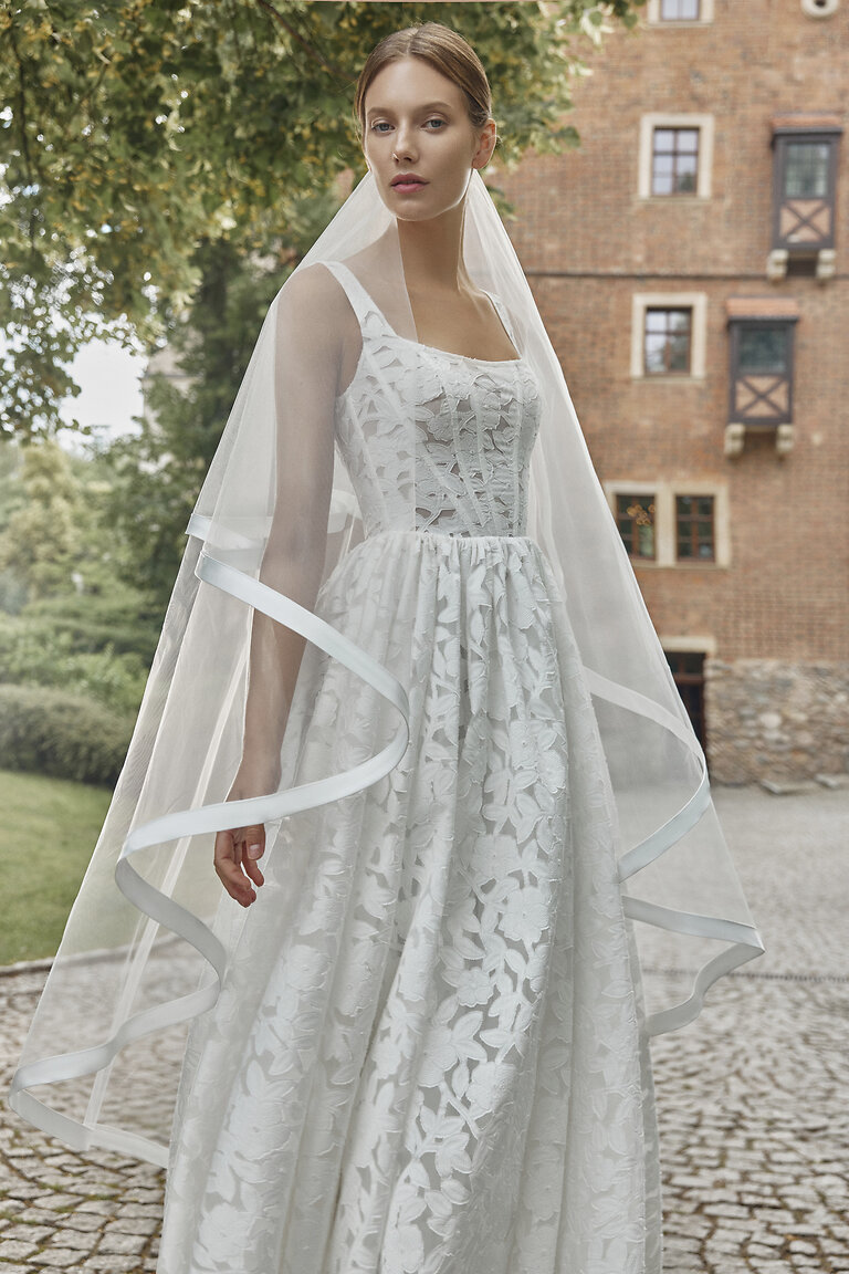 Exquisite Floral Texture and Ribbon-Edged Bridal Veil Front look of Ruta lace A-line bridal dress paired with cascading ribbon-trimmed veil